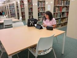 student studying at desk