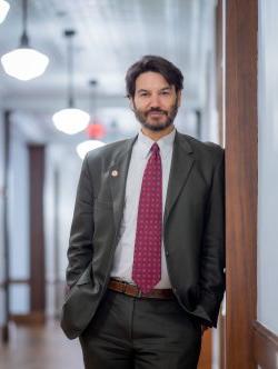 Montclair State University President Jonathan Koppell poses by inside Cole Hall on campus.