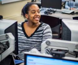 Photo of a student in lab in a translation class.