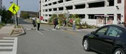 Picture of crossing guards and students at the Car Parc Diem crosswalk.